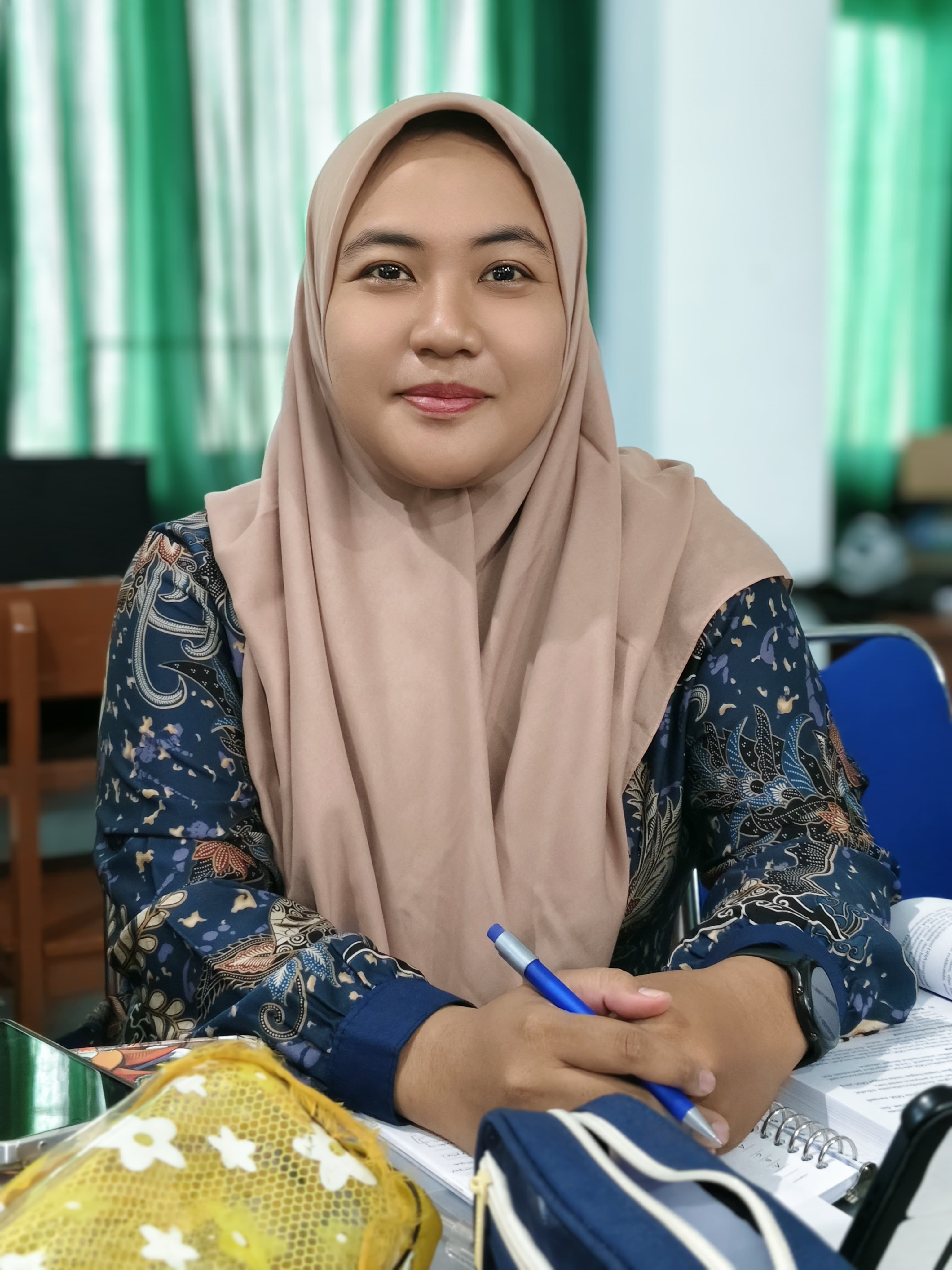 Foto PUTRI ILMI RUKMANA S.PD